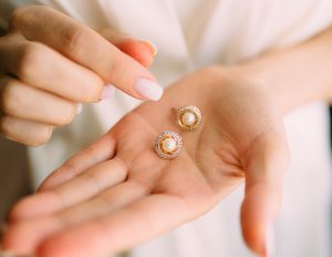 close-up-photo-of-person-holding-earrings-1721937-e1576600853258-300x232.jpg