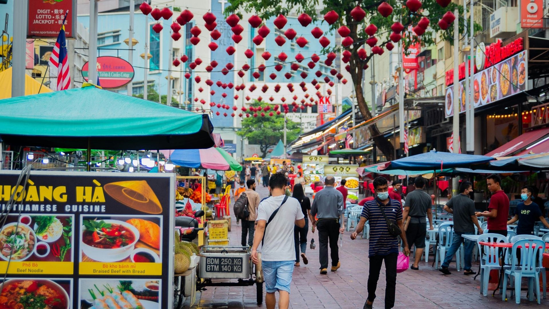 a group of people walking down a street