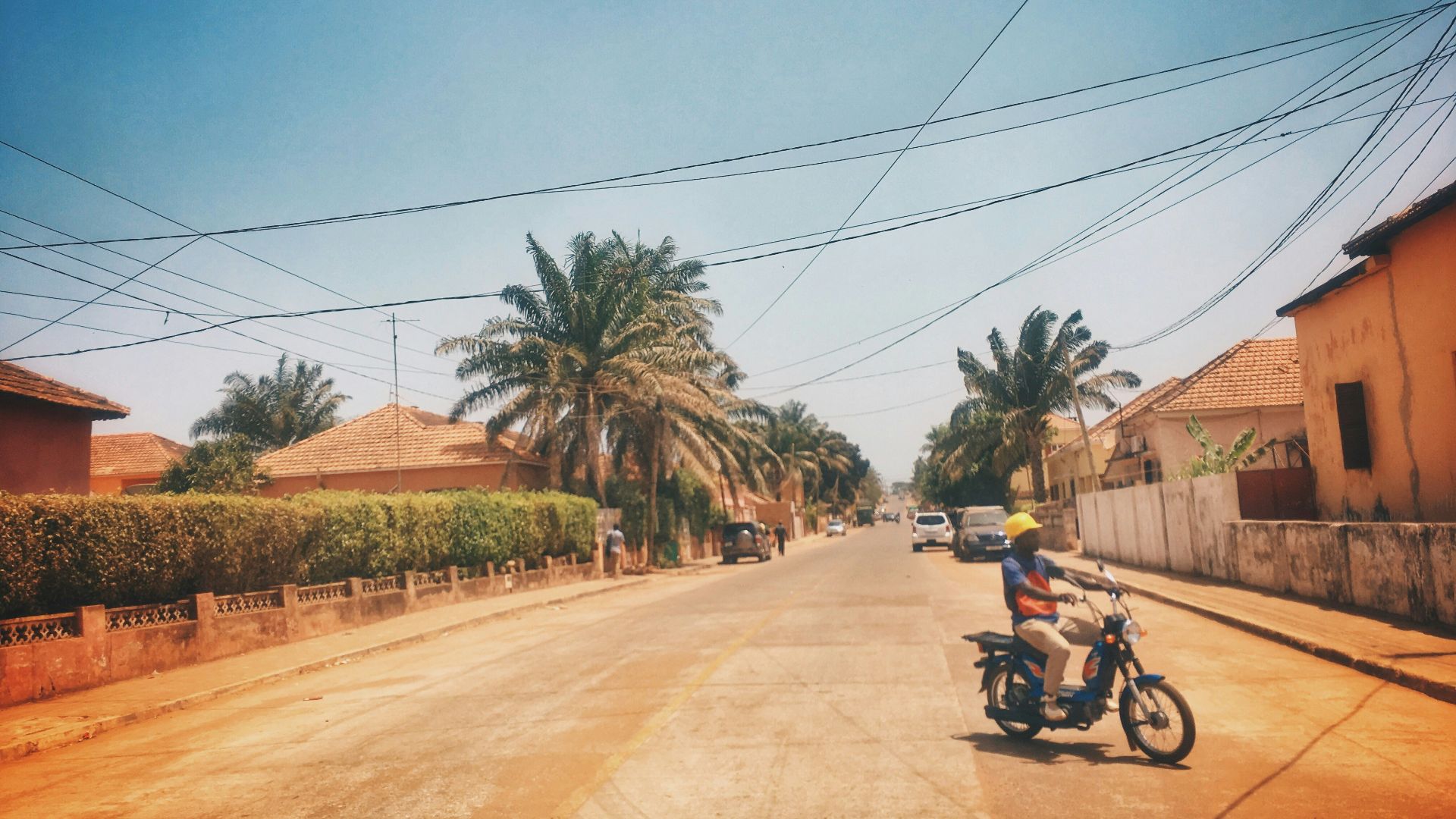 man riding motorcycle on road during daytime
