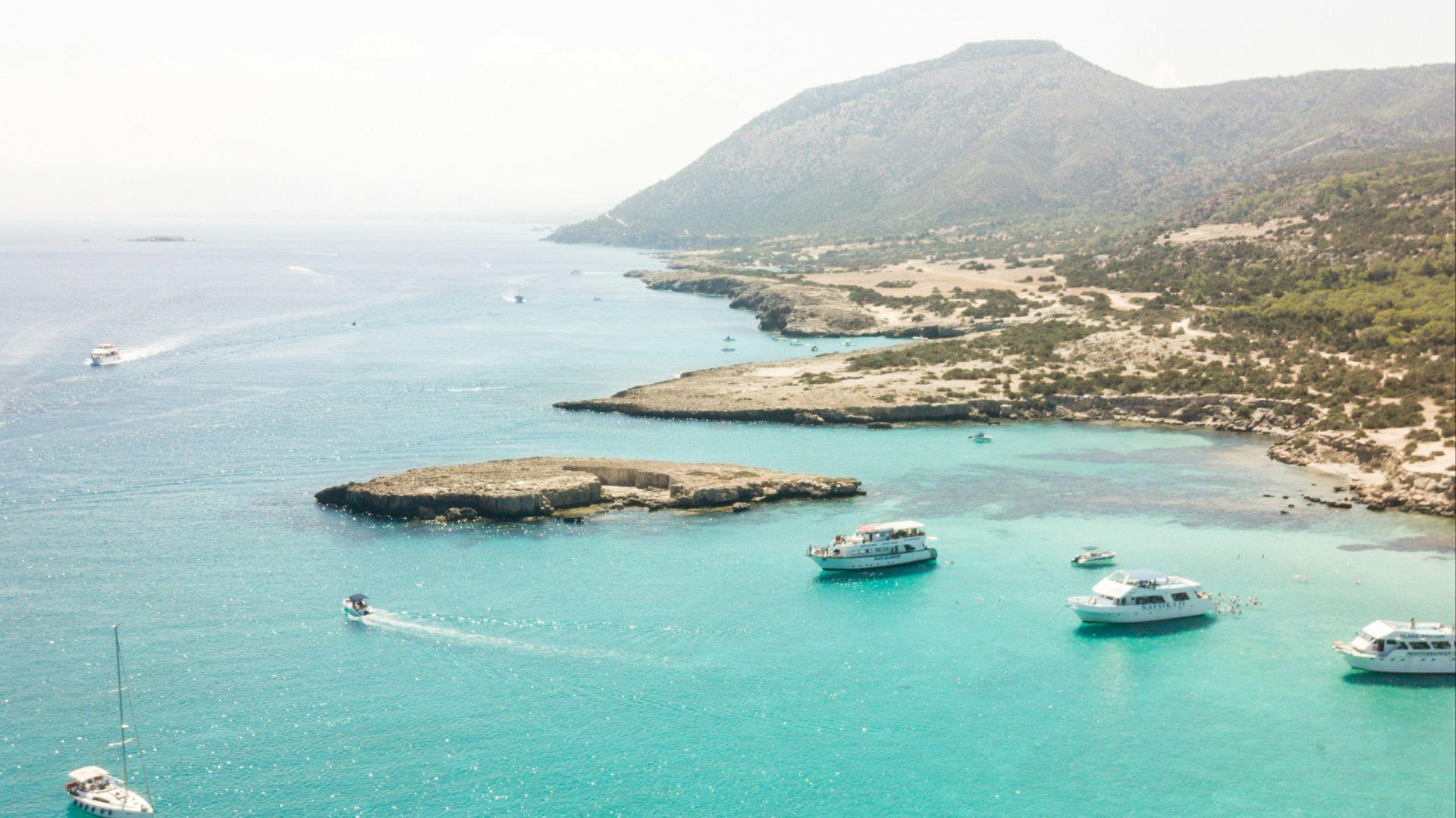 yachts on body of water at daytime