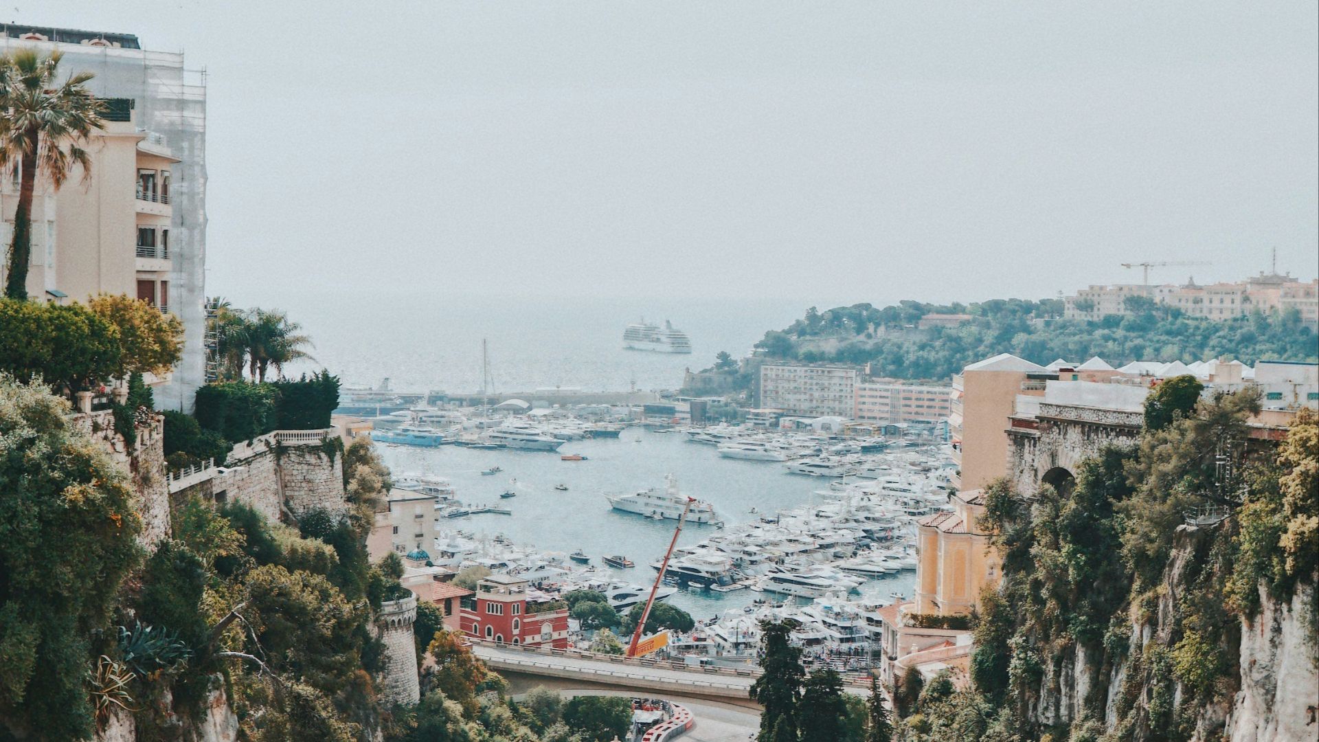 aerial view of city buildings near body of water during daytime