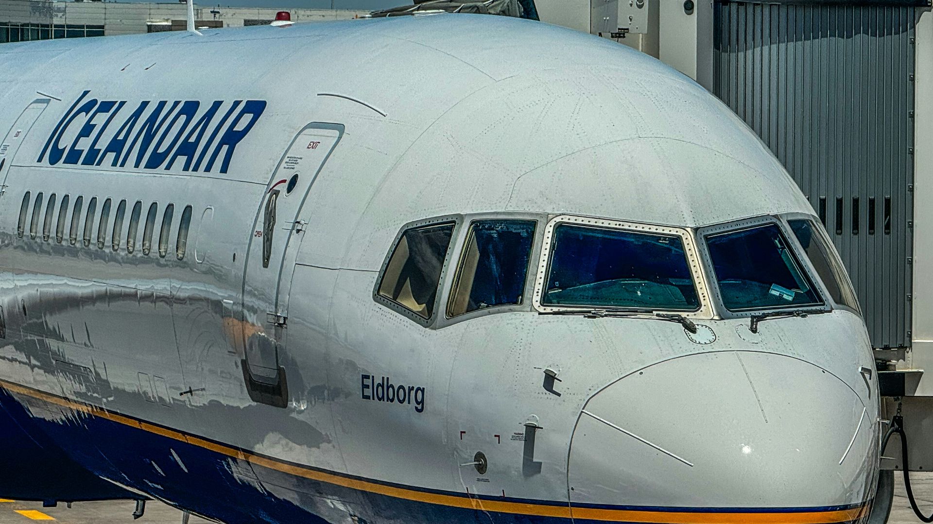 A large jetliner sitting on top of an airport tarmac