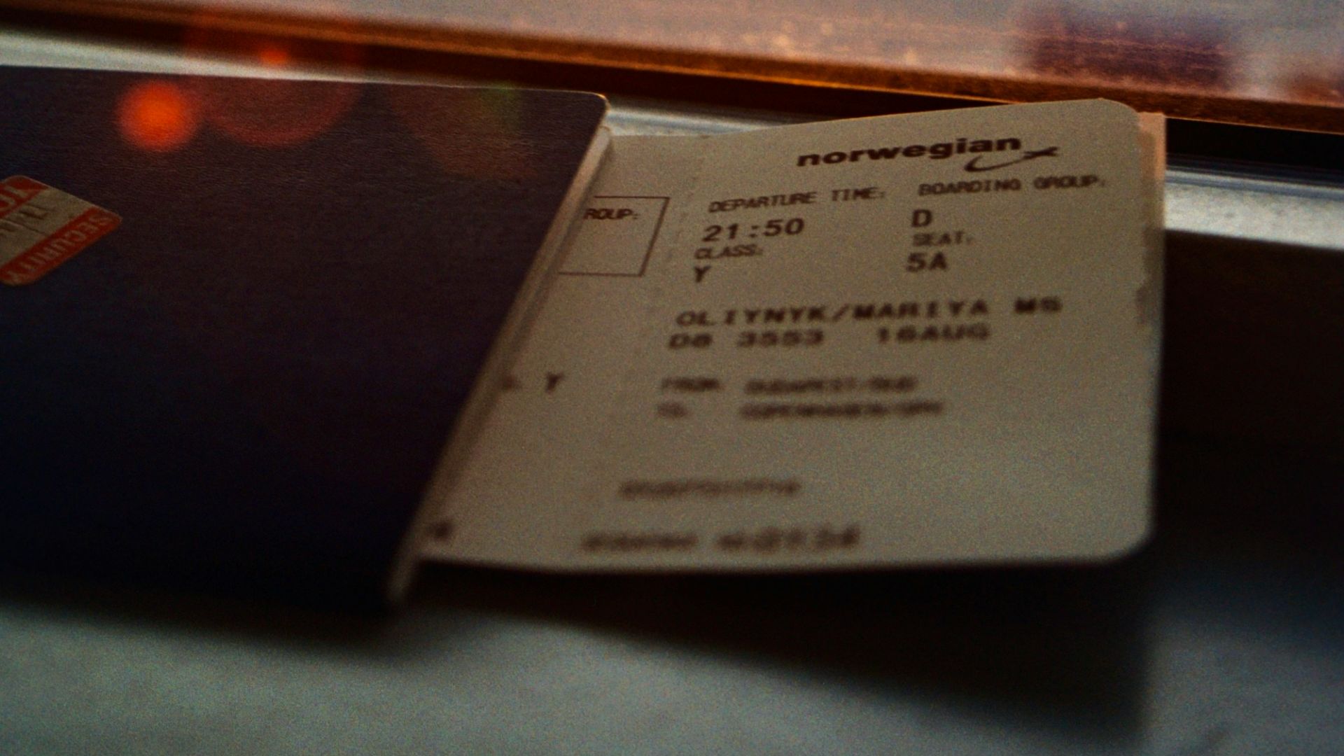 white printer paper on glass window during sunset