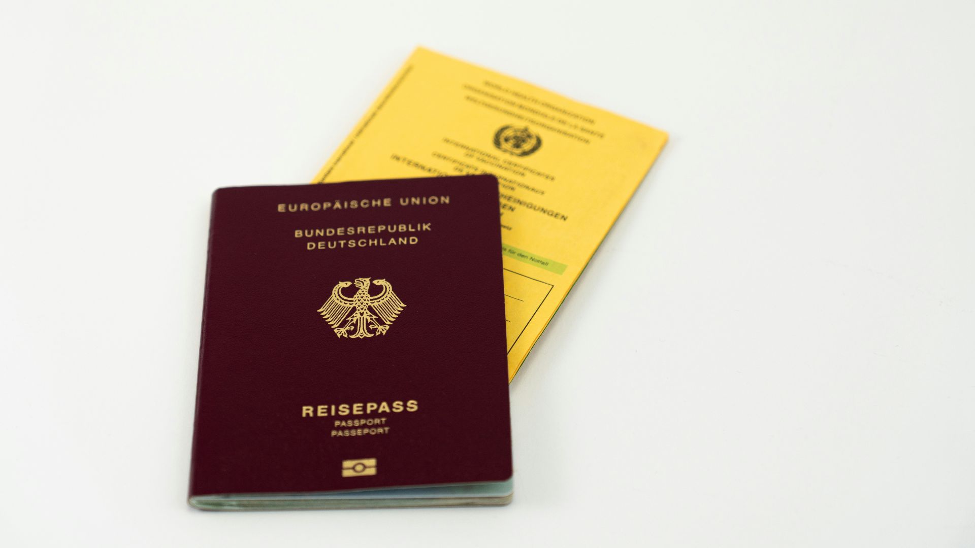 red and yellow book on white table