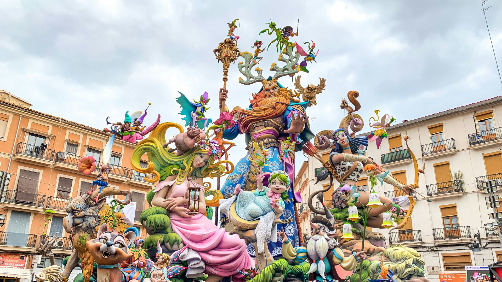 a group of people standing in front of a float