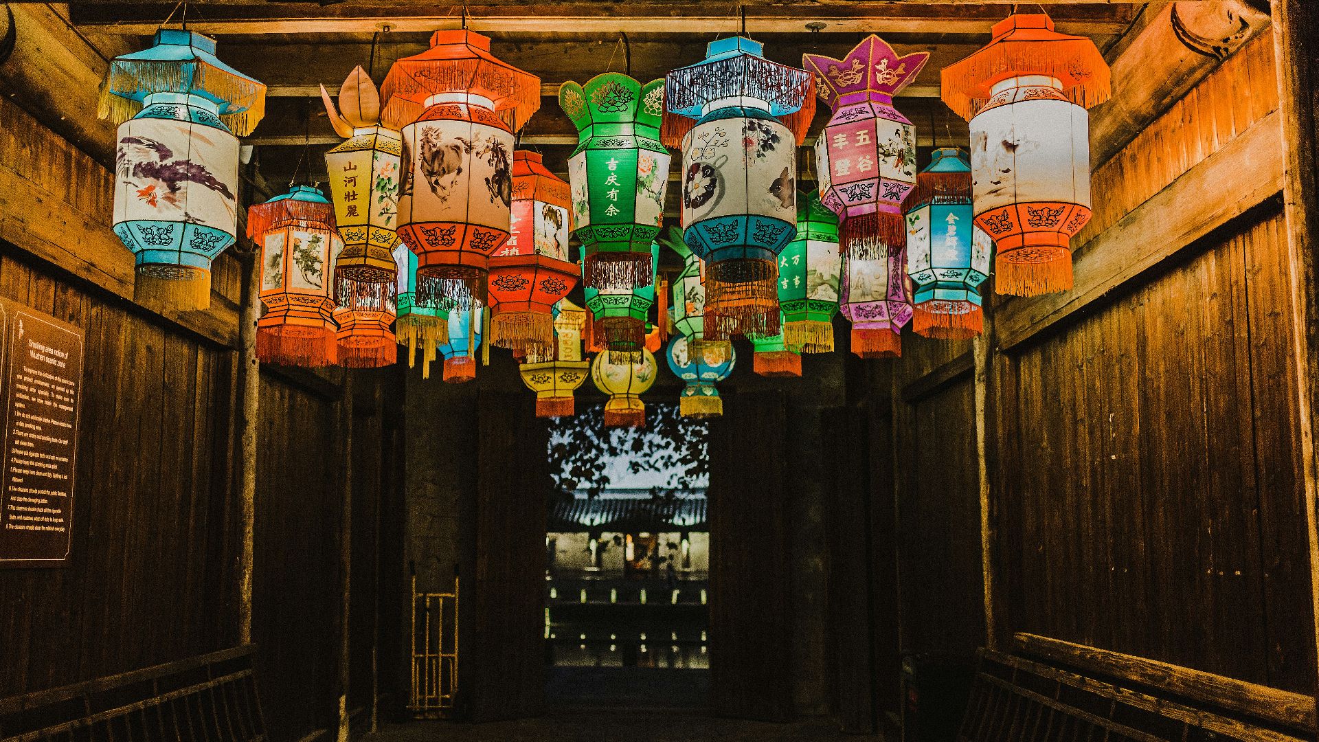 photo of assorted-color Chinese lanterns inside room