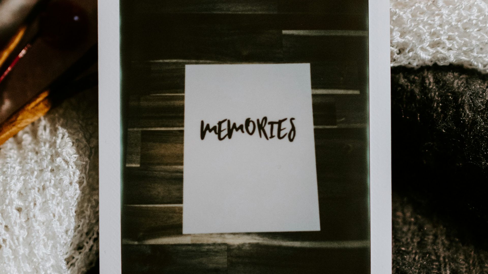 white ipad mini on black textile