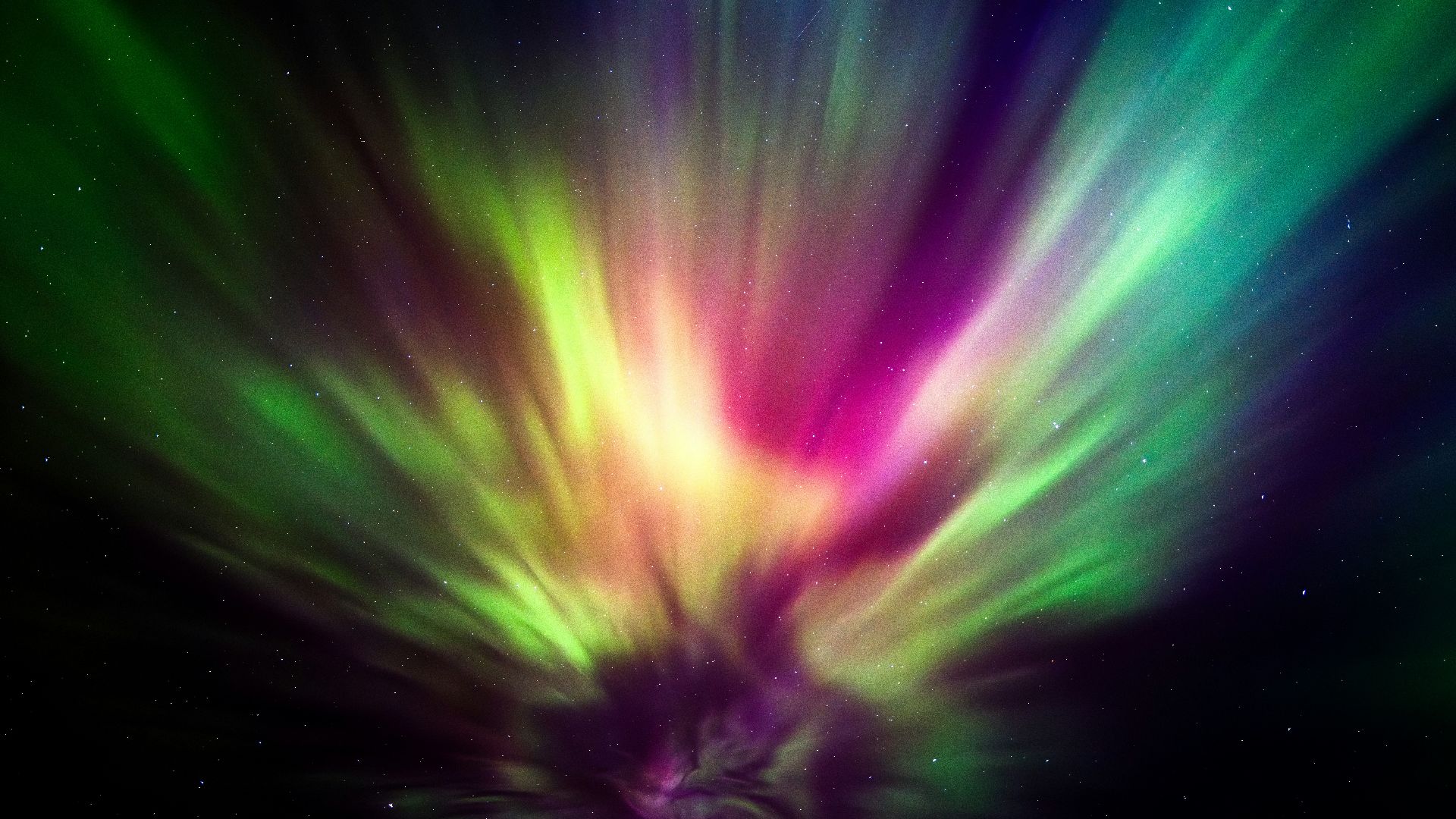 a colorful aurora bore in the night sky