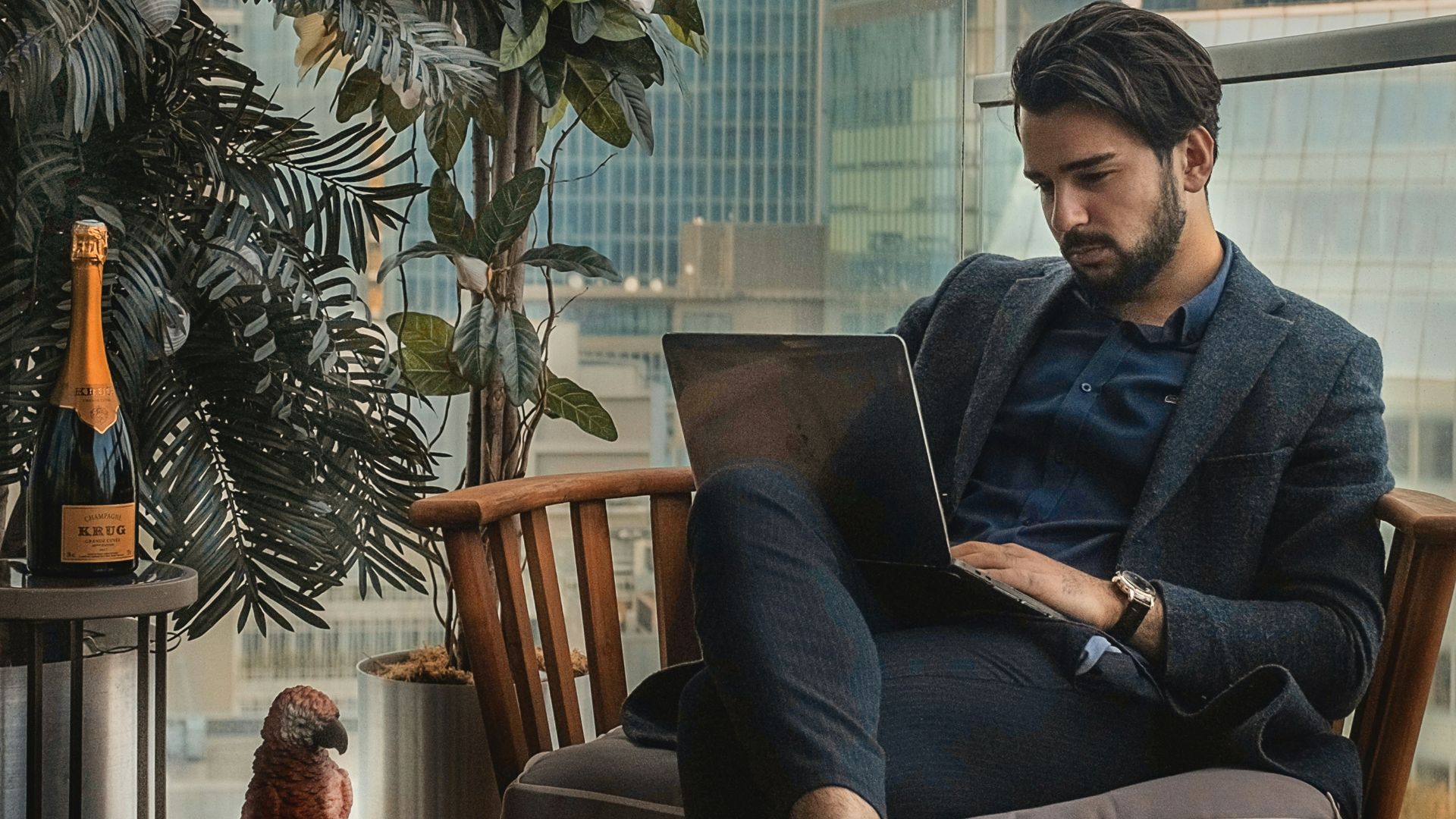 man sitting beside side table