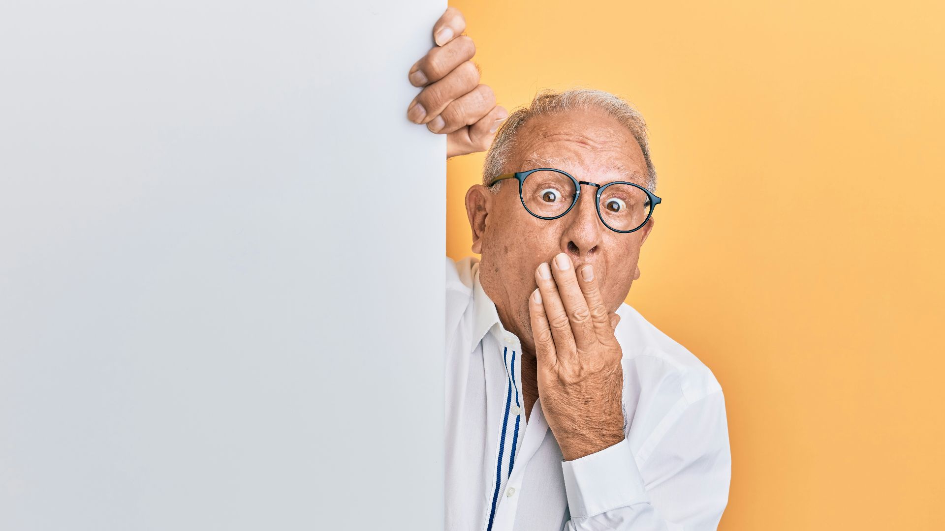 man in white dress shirt wearing black framed eyeglasses