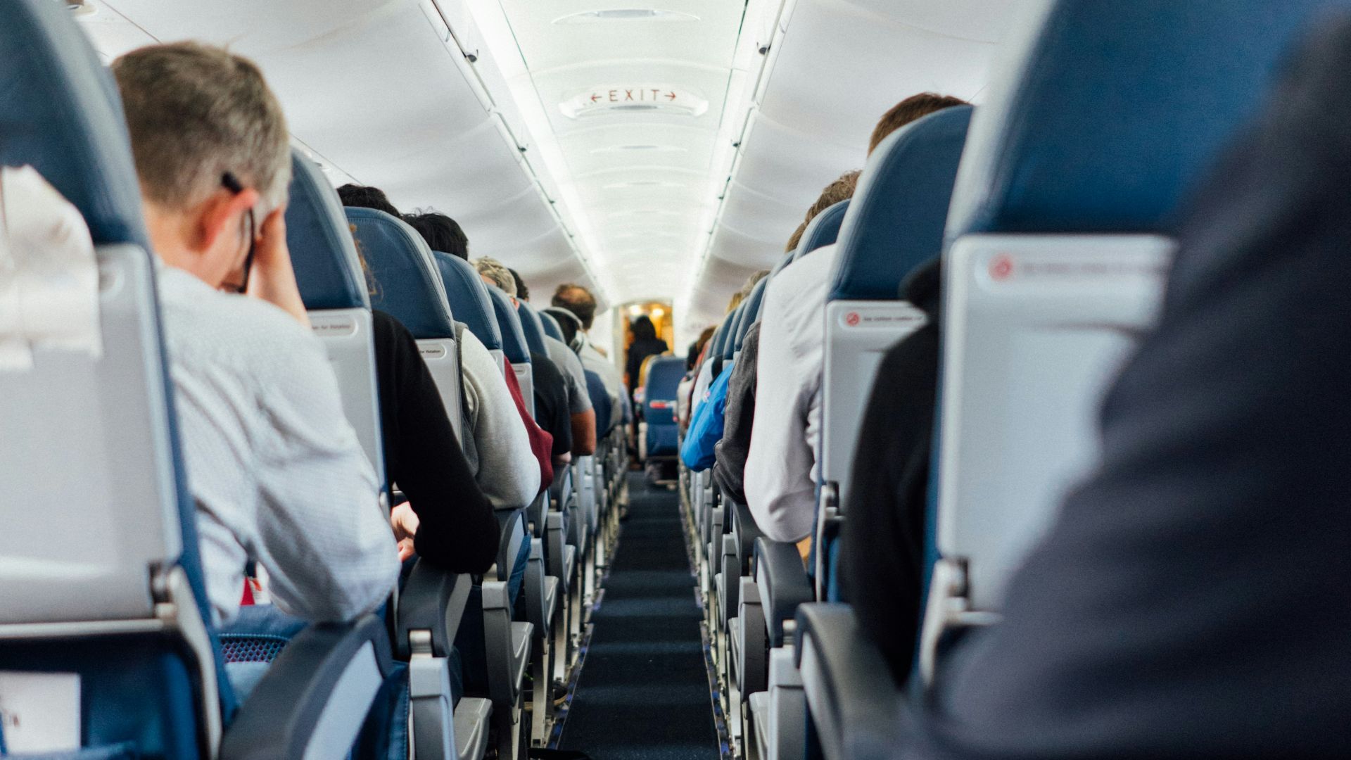 people sitting inside plane