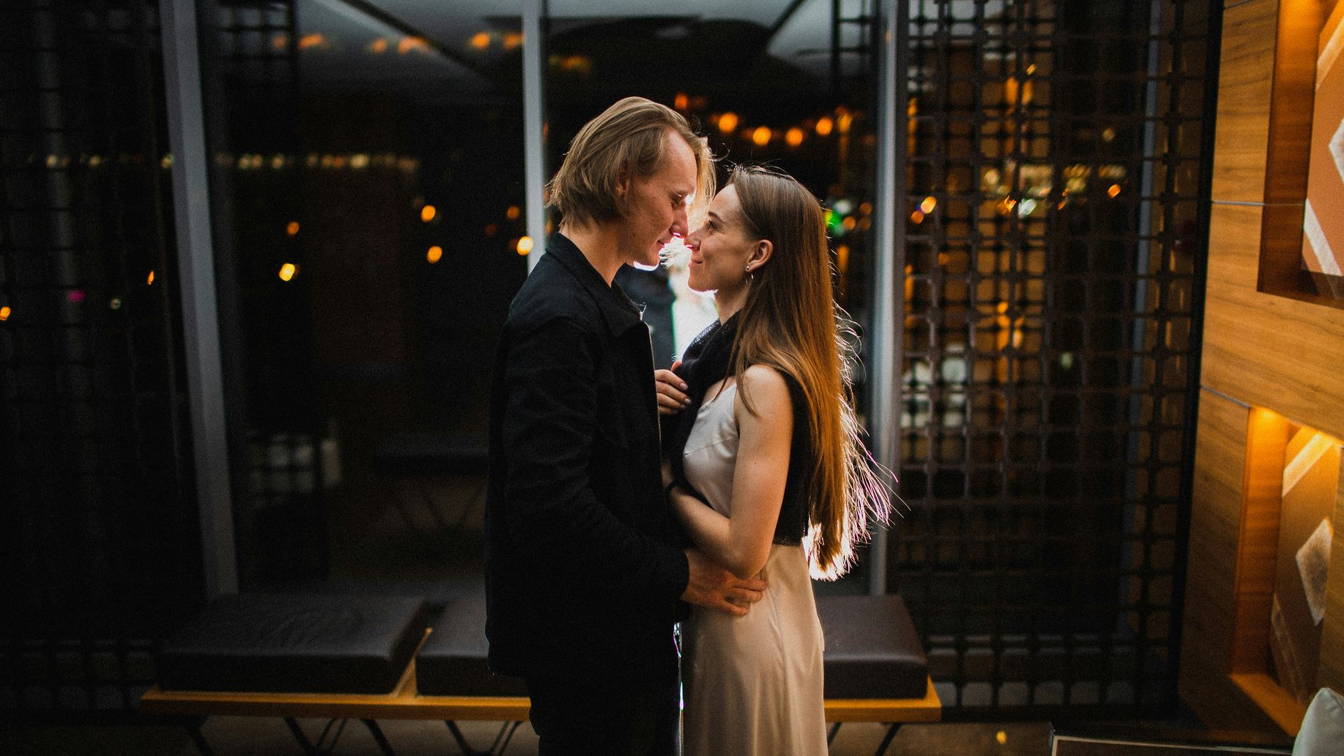 a man and a woman standing next to each other