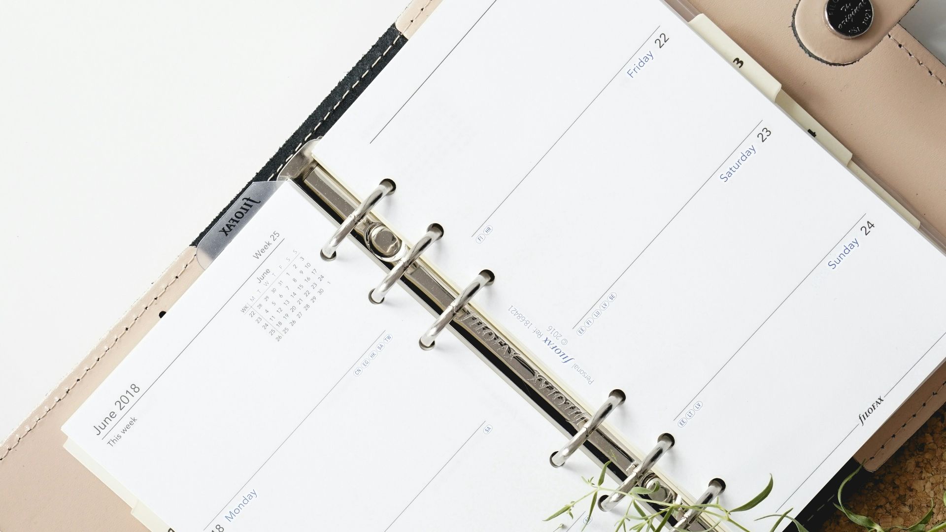 white and browm notebook