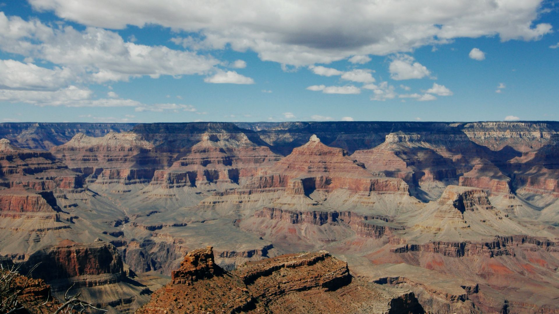brown rocky mountain under blue sky during daytime