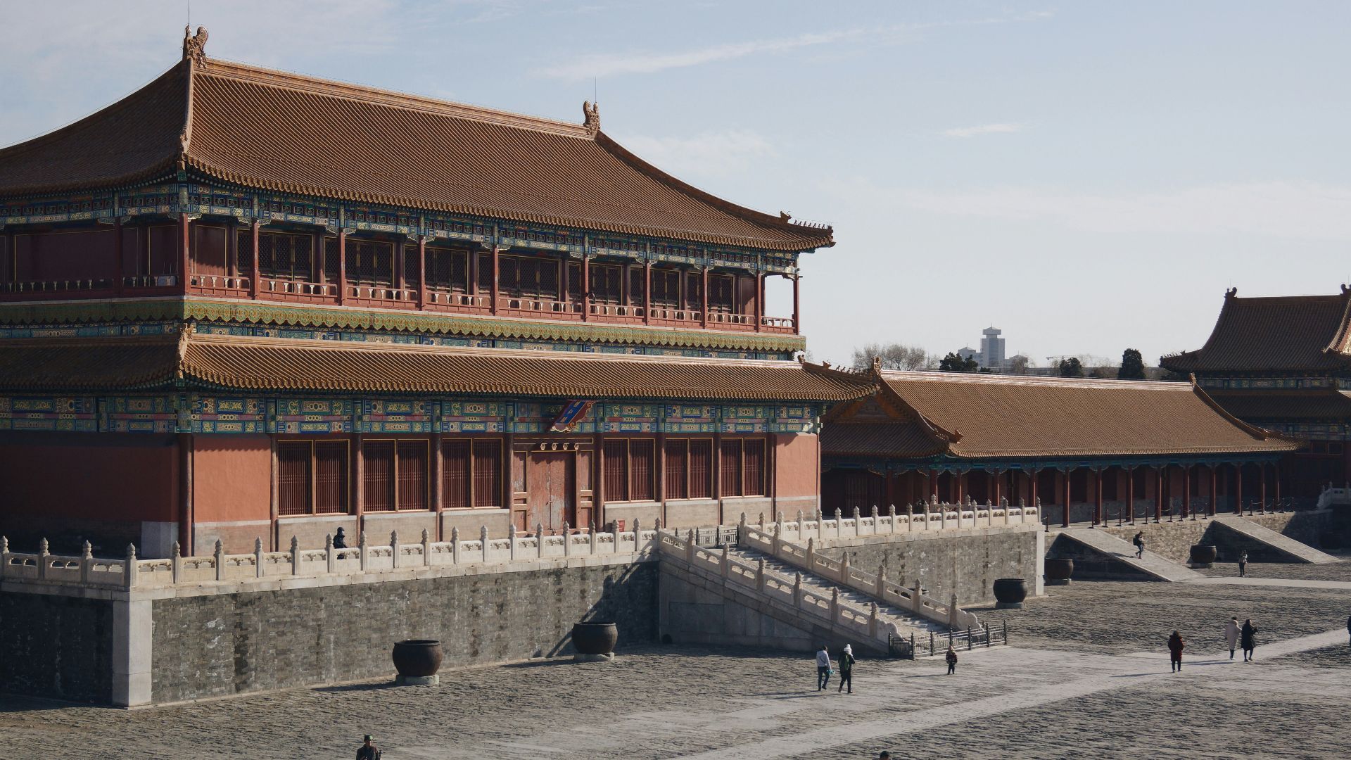 a group of people standing in front of a building