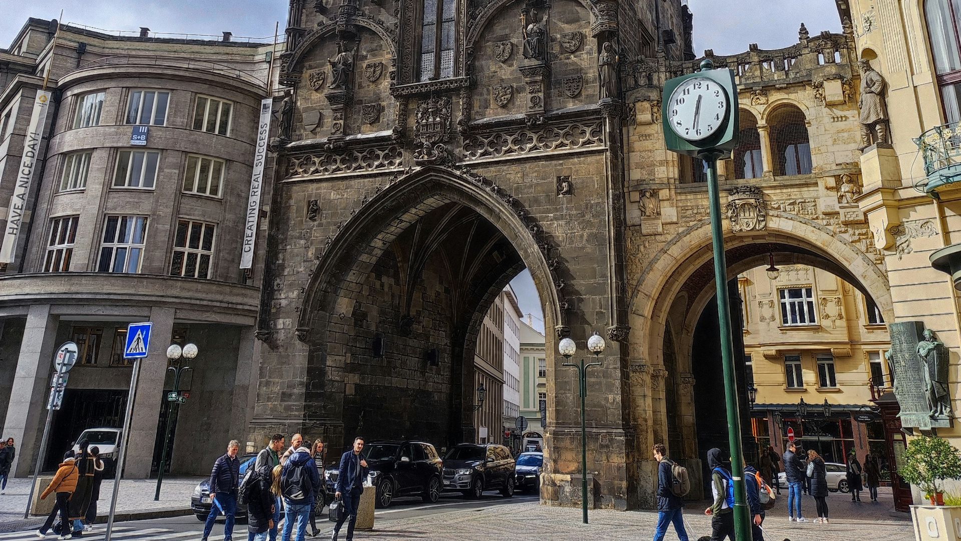 a large building with a clock on the front of it