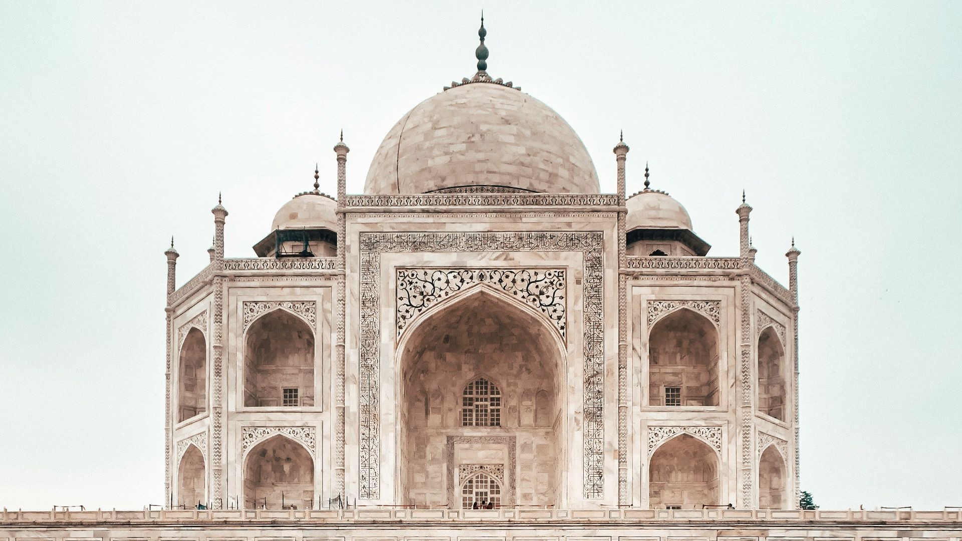 brown painted mosque during daytime