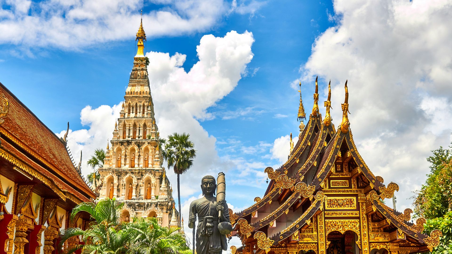 standing statue and temples landmark during daytime