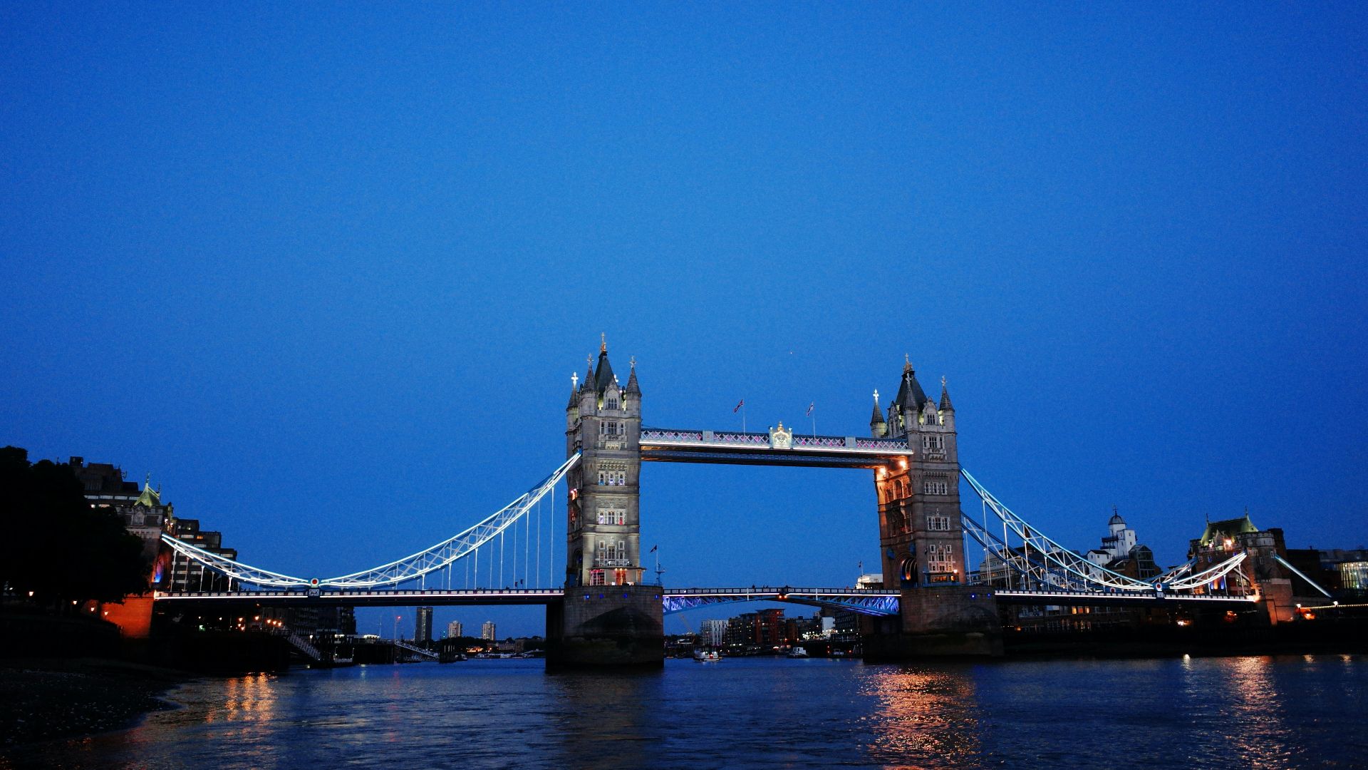 brown bridge under blue sky during daytime