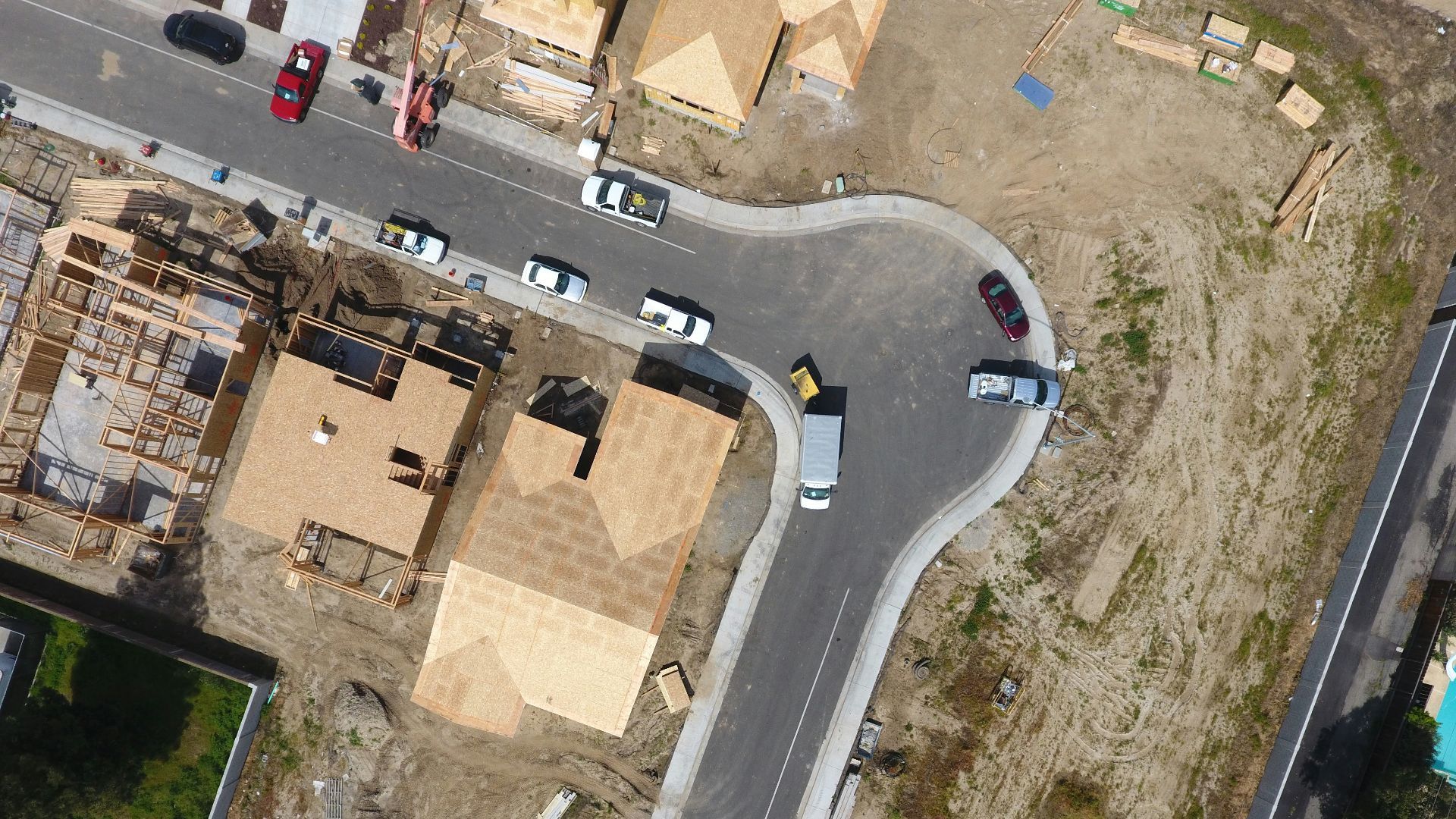 aerial view of vehicles on road during daytime