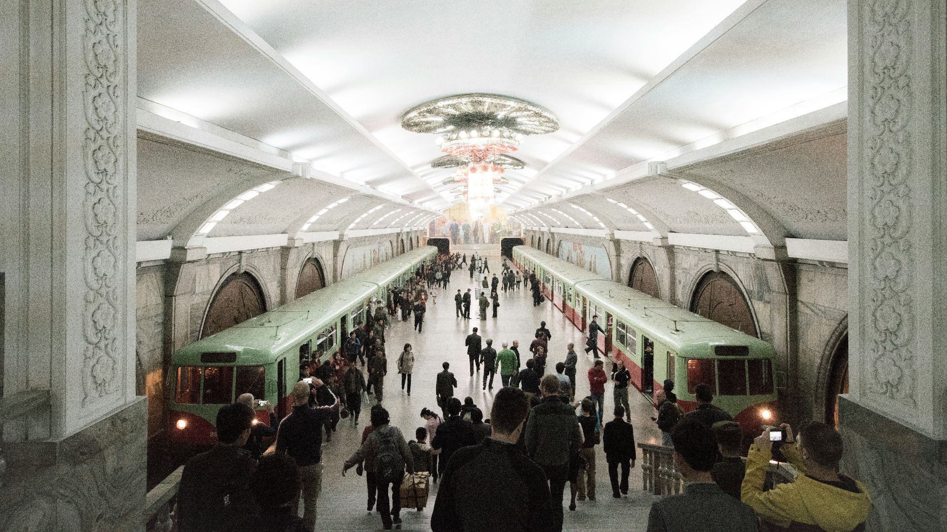 group of people riding to the train
