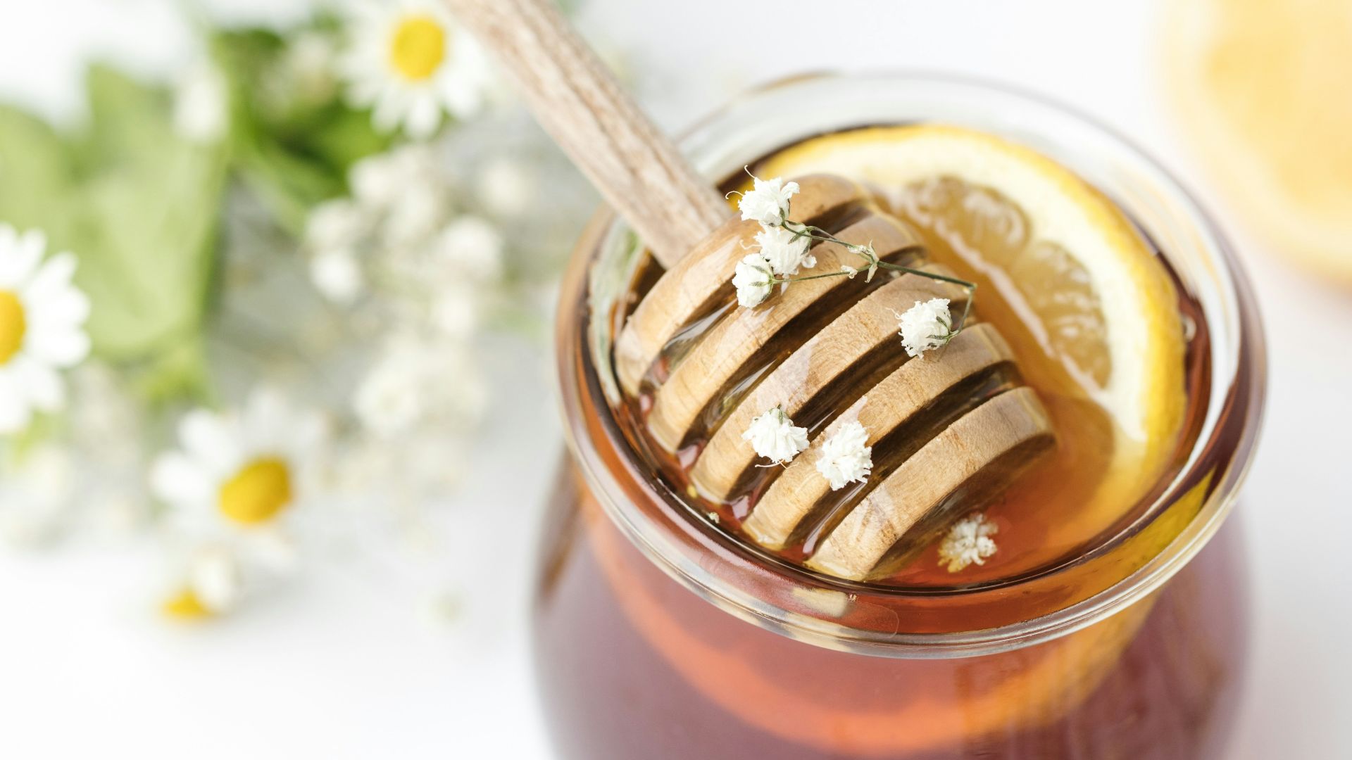 honey in glass on tabel