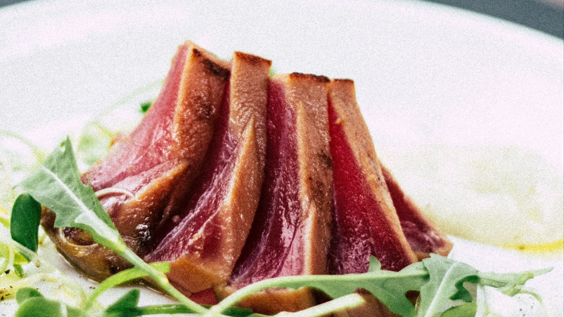roasted meat served on ceramic plate