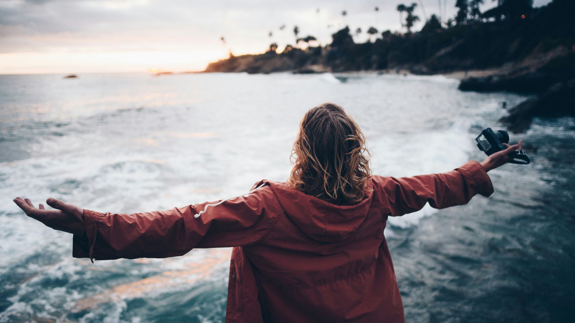 person standing near body of water
