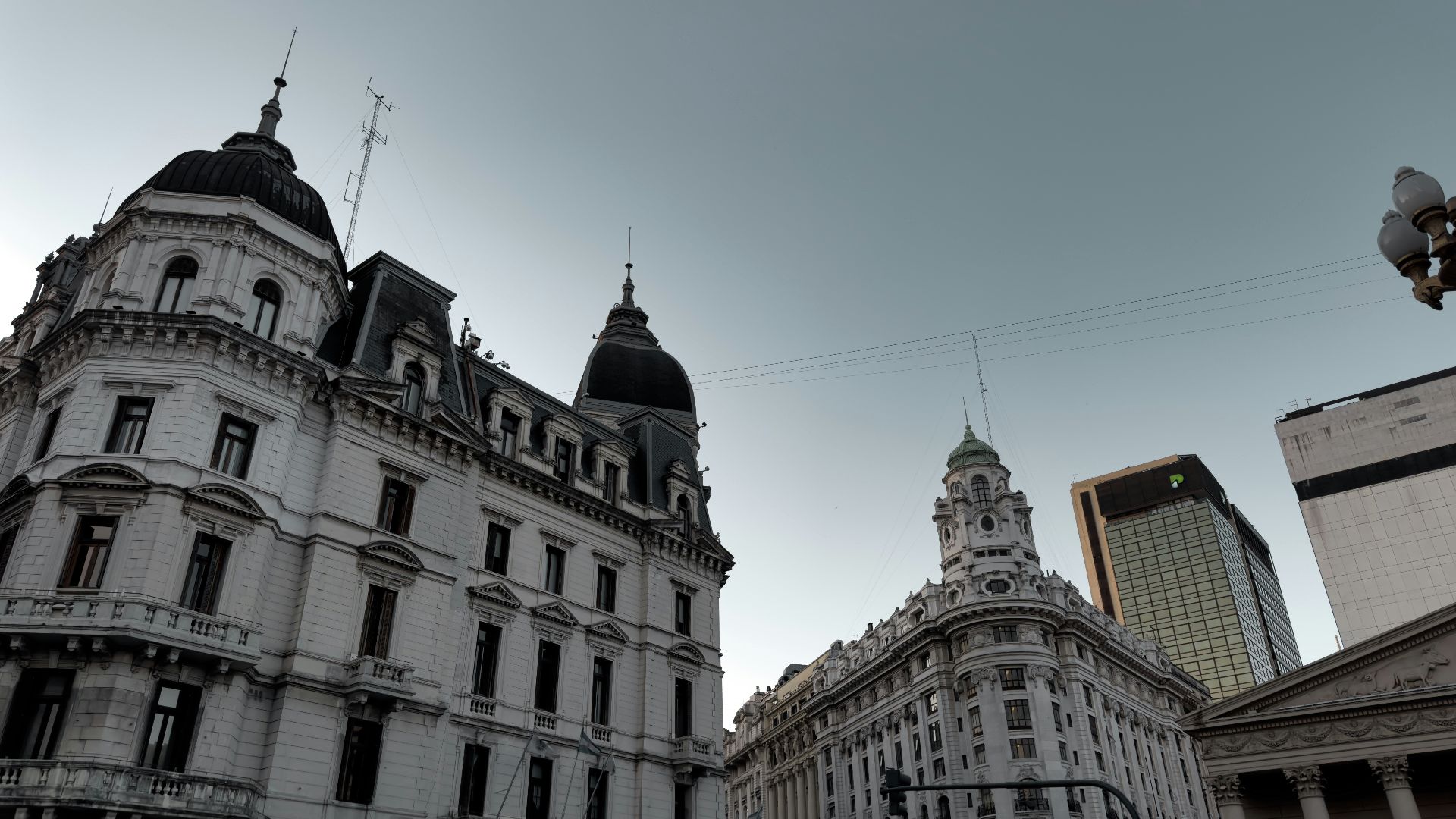 a large building with a clock on the top of it
