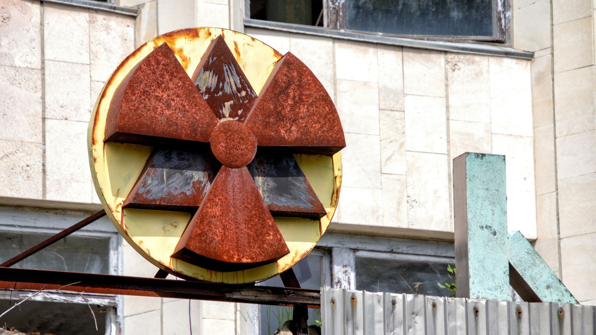 red and yellow radioactive signage at the building