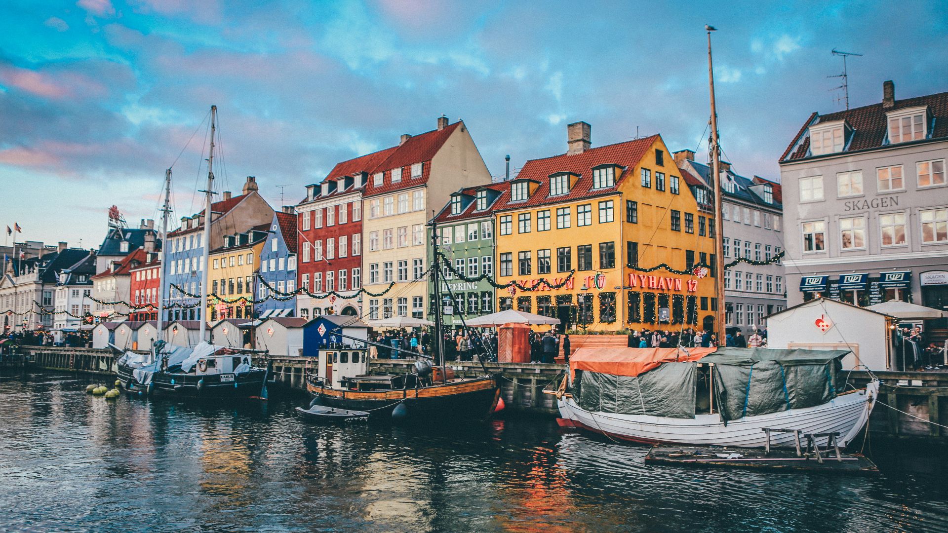 two gray and black boats near dock