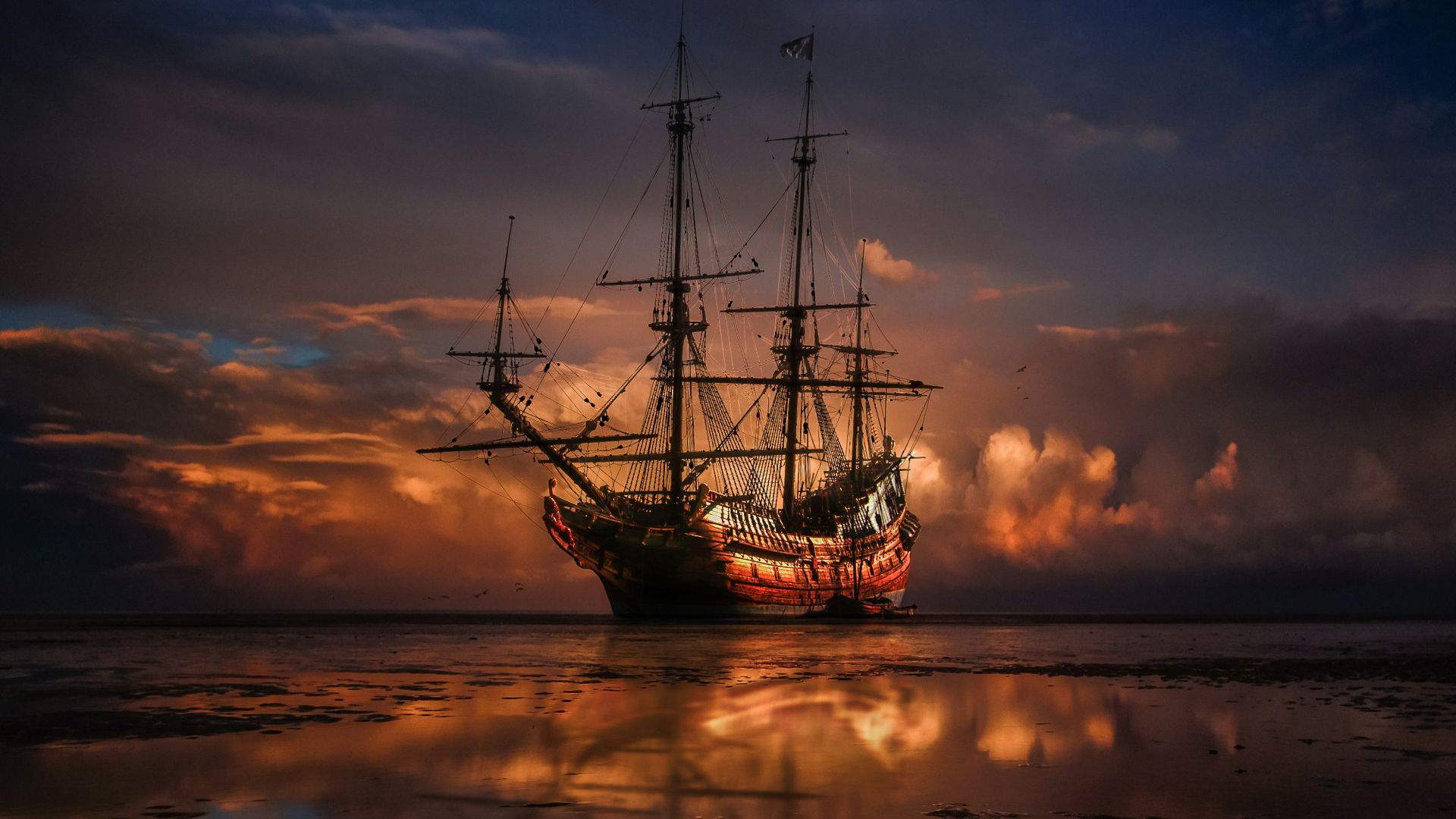 brown ship on sea during sunset