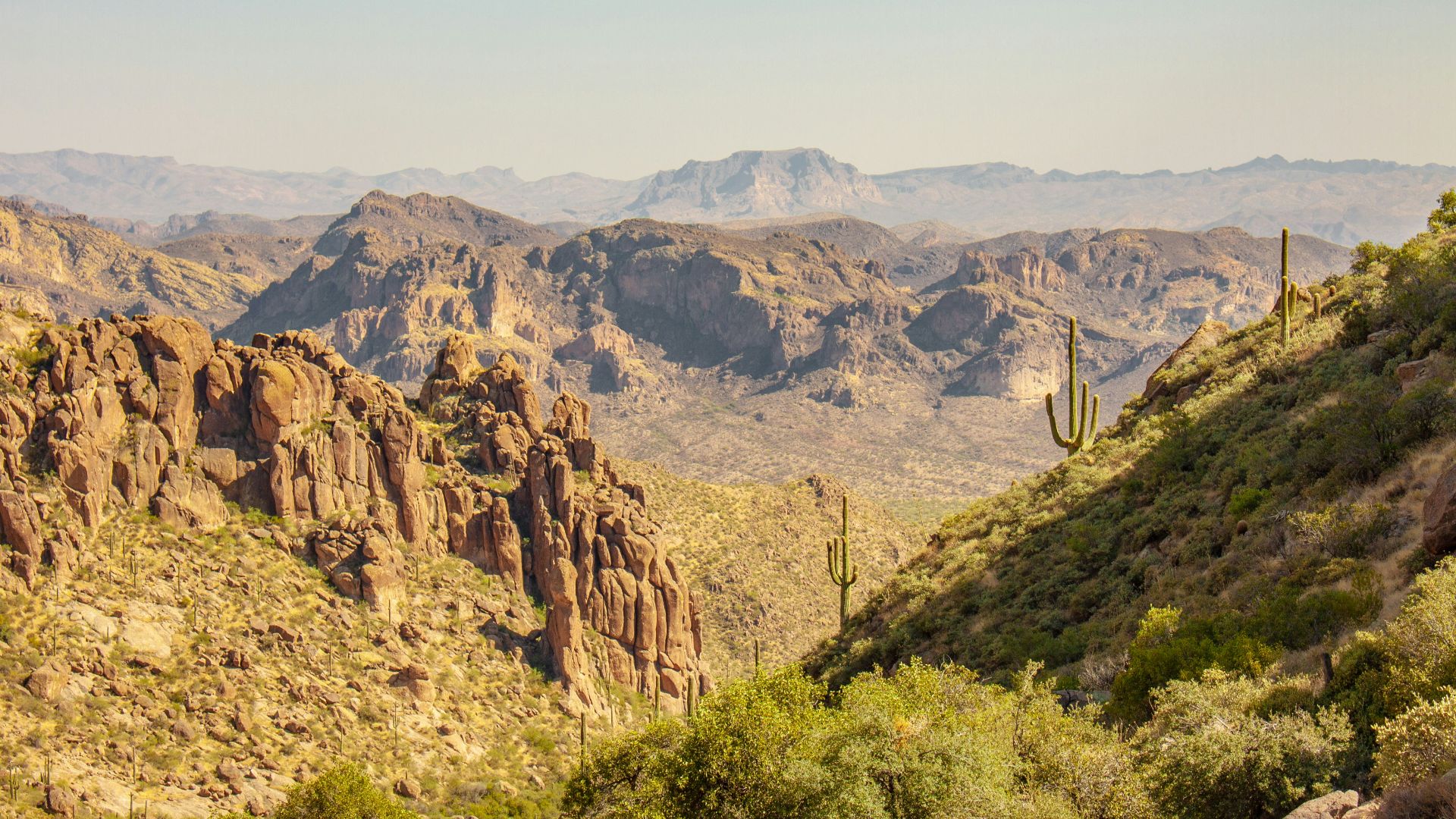 brown rocky mountain under blue sky during daytime