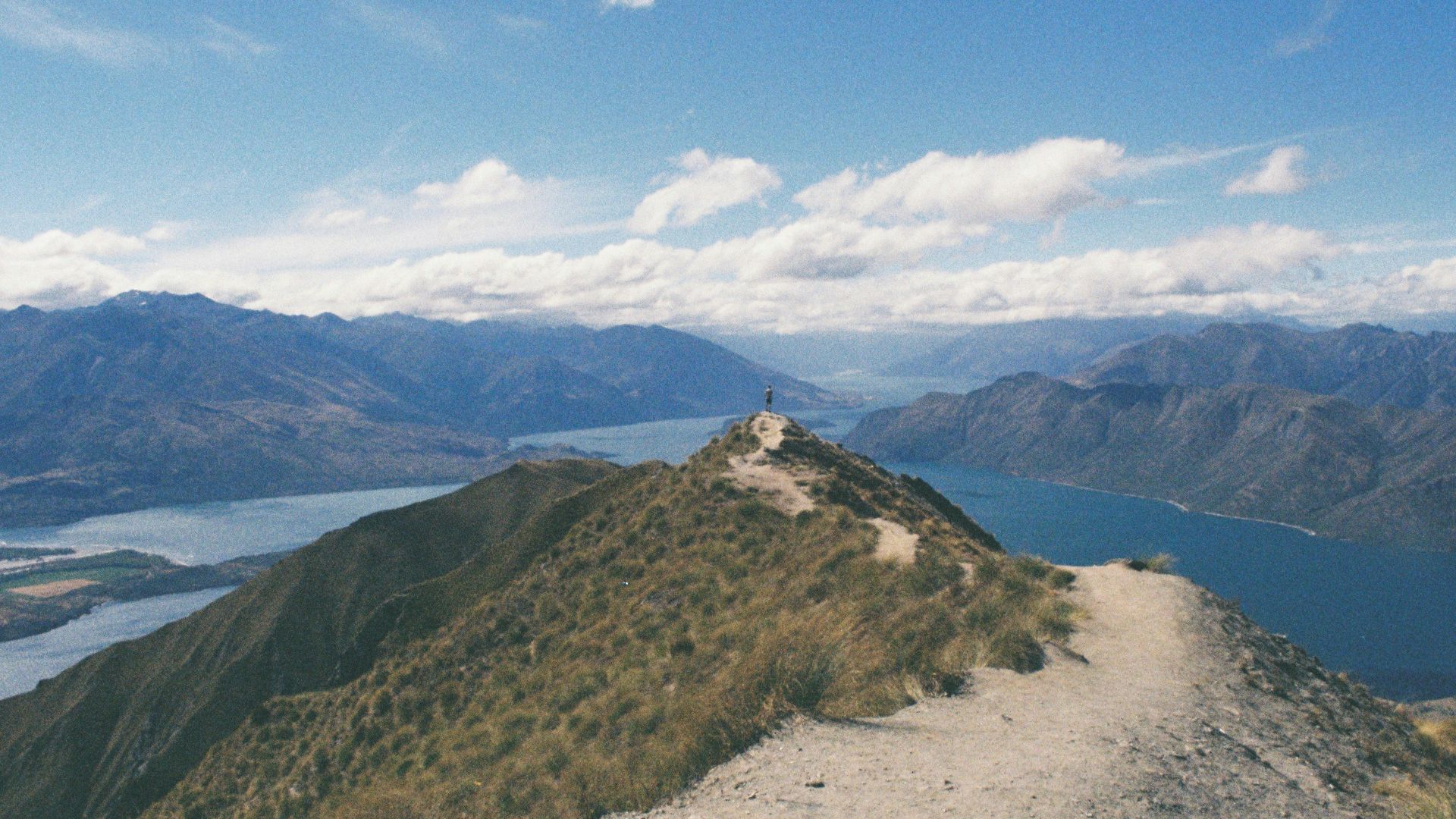 photography of mountain near body of water