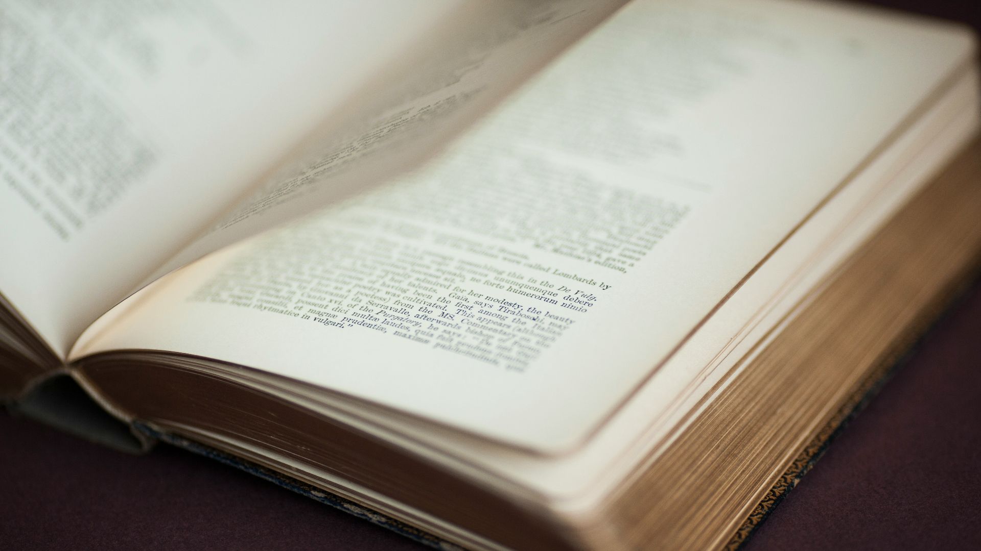 white book page on brown wooden table