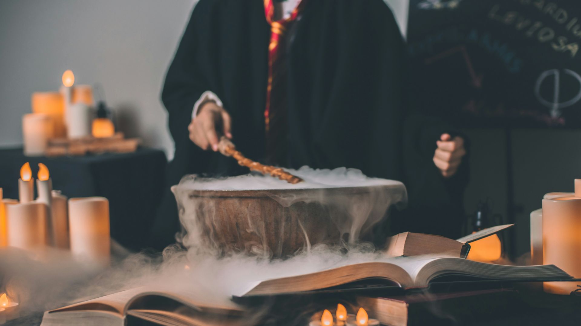 person holding wand on top of bowl