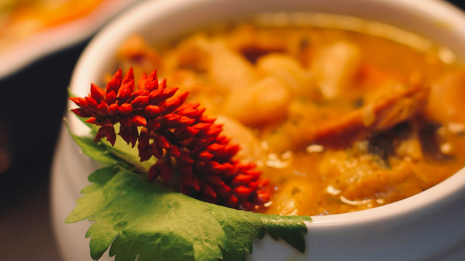 a close up of a bowl of food on a table