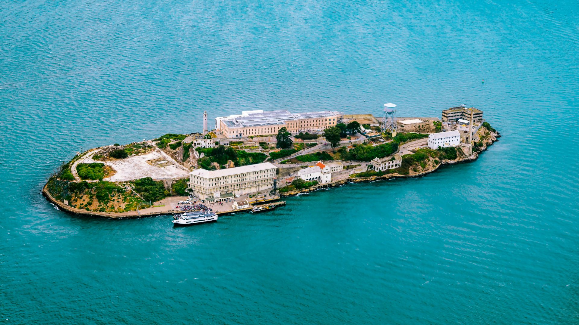 top view photography of island surrounded by body of water