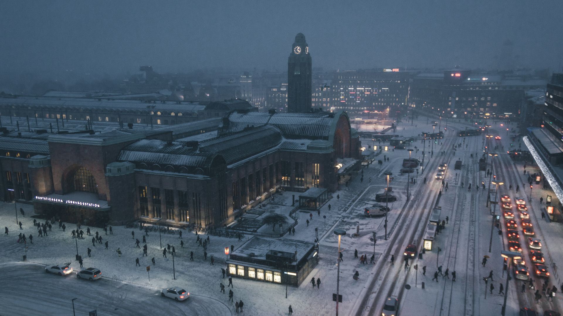 aerial photography of street at night covered with snow