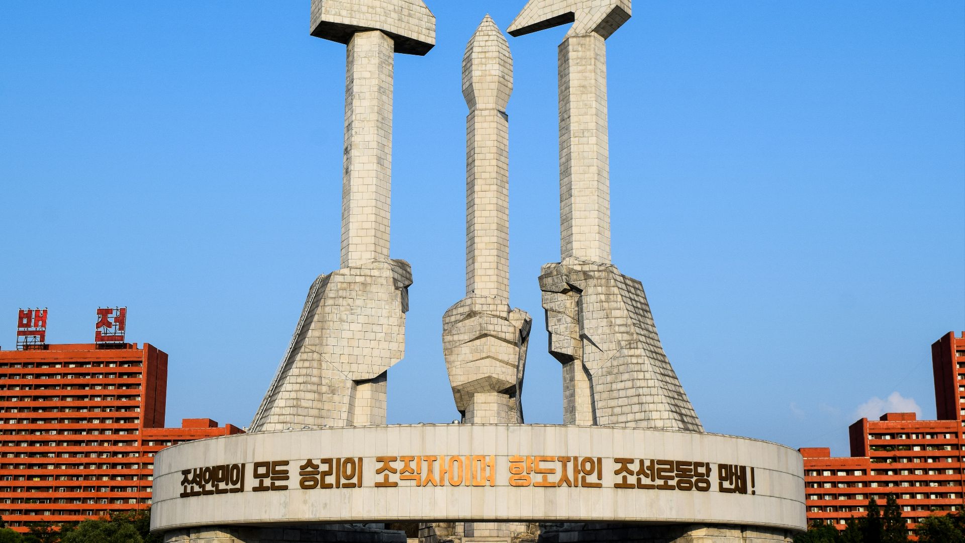 white concrete building under blue sky during daytime
