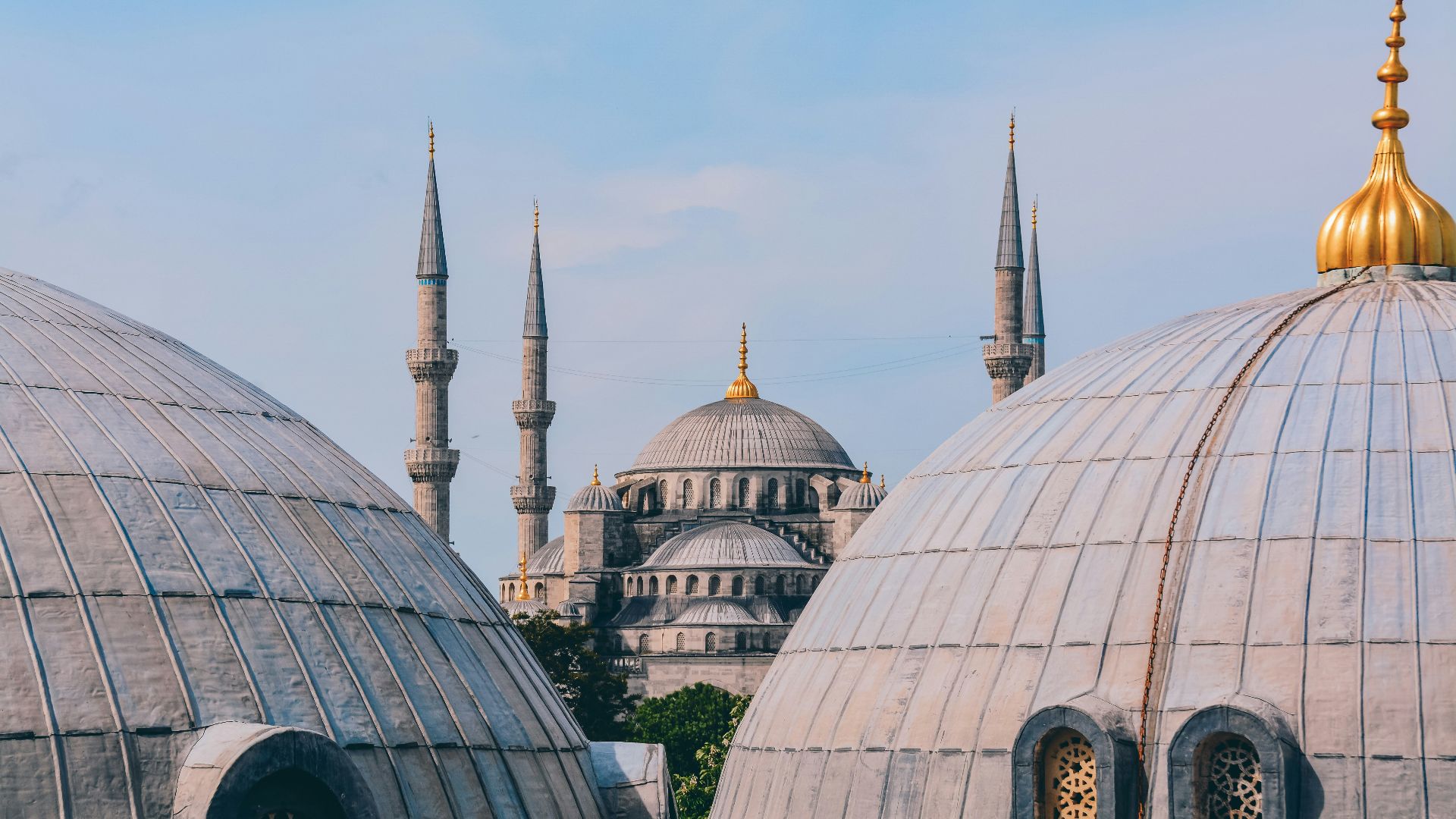 a group of domes with a sky background