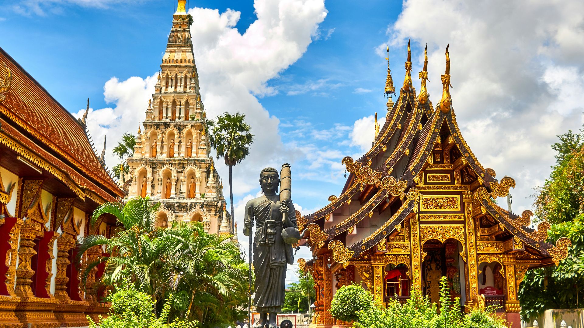 standing statue and temples landmark during daytime