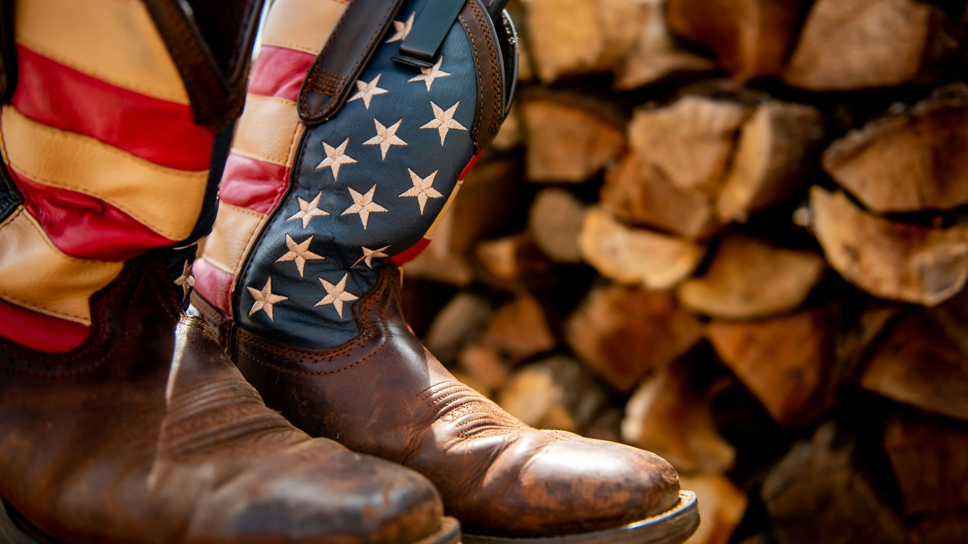 a pair of boots with a flag