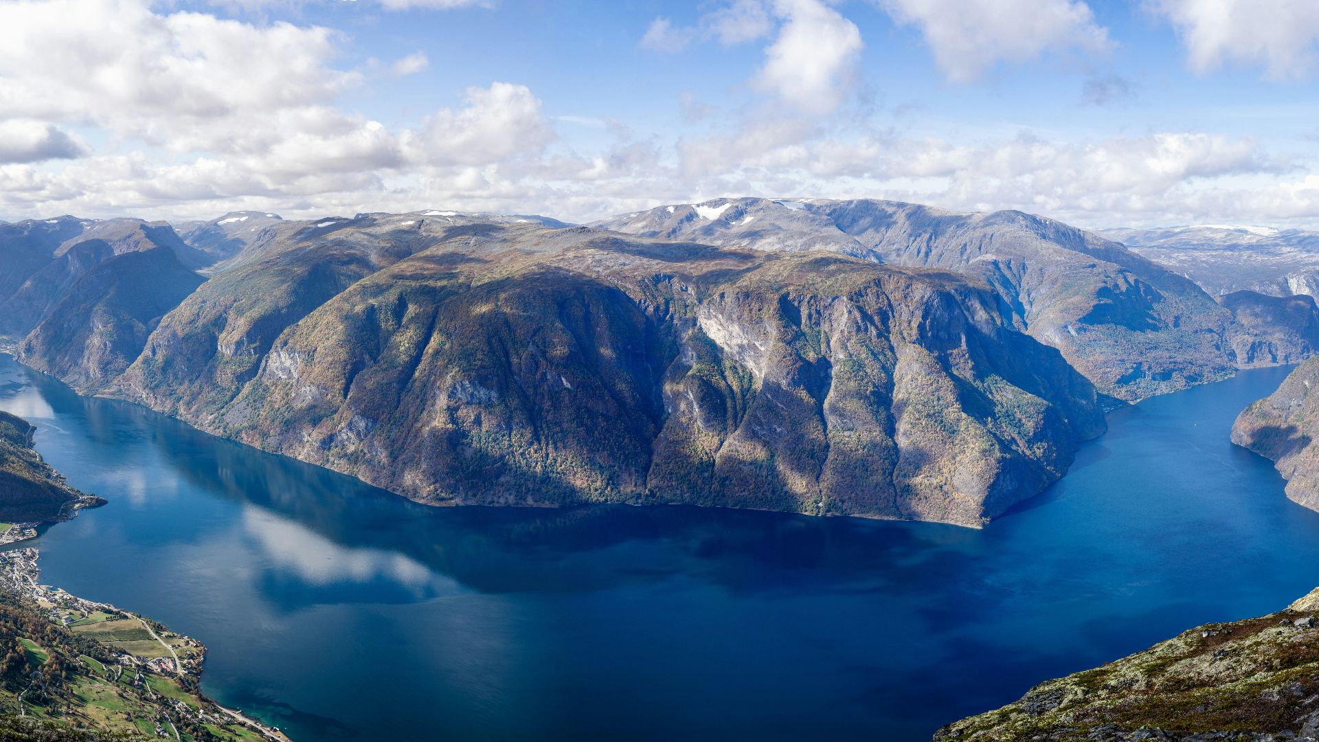 a large body of water surrounded by mountains