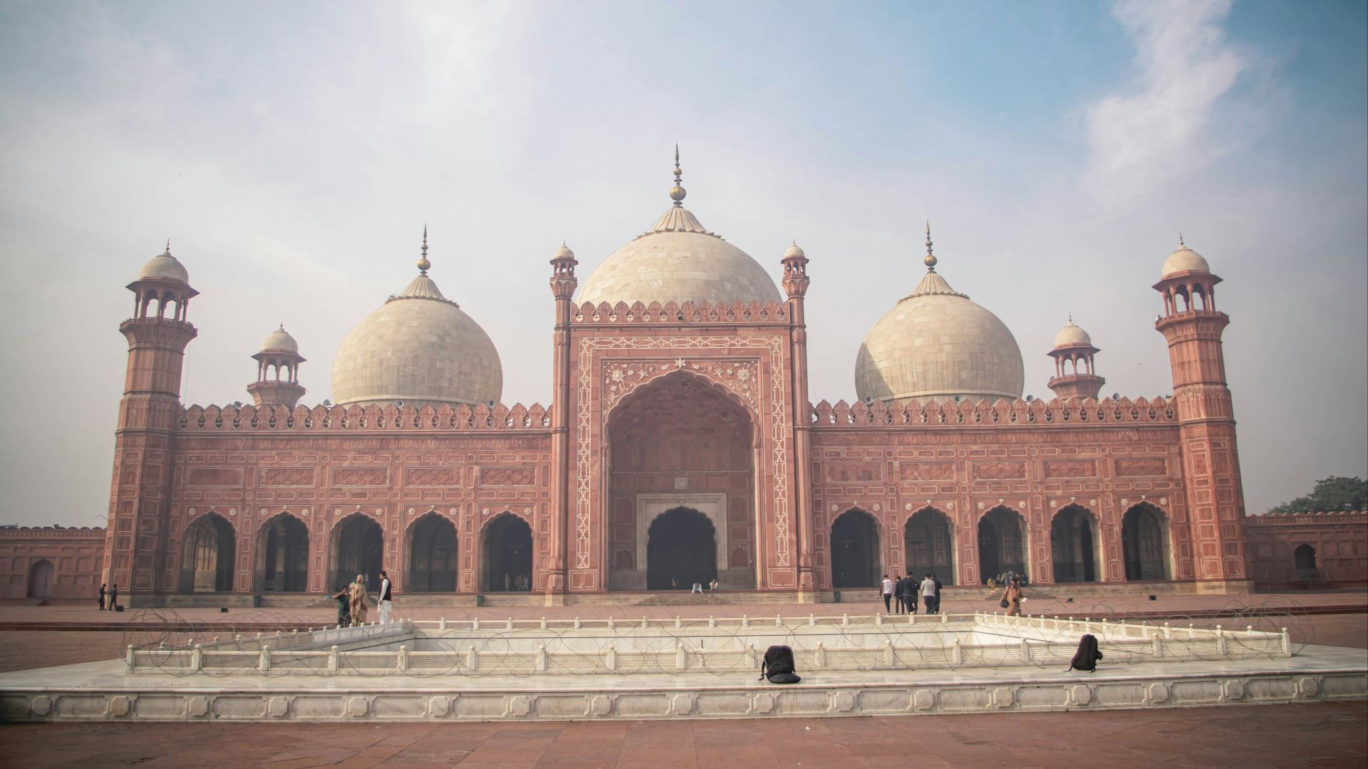 brown and white dome building under white sky during daytime