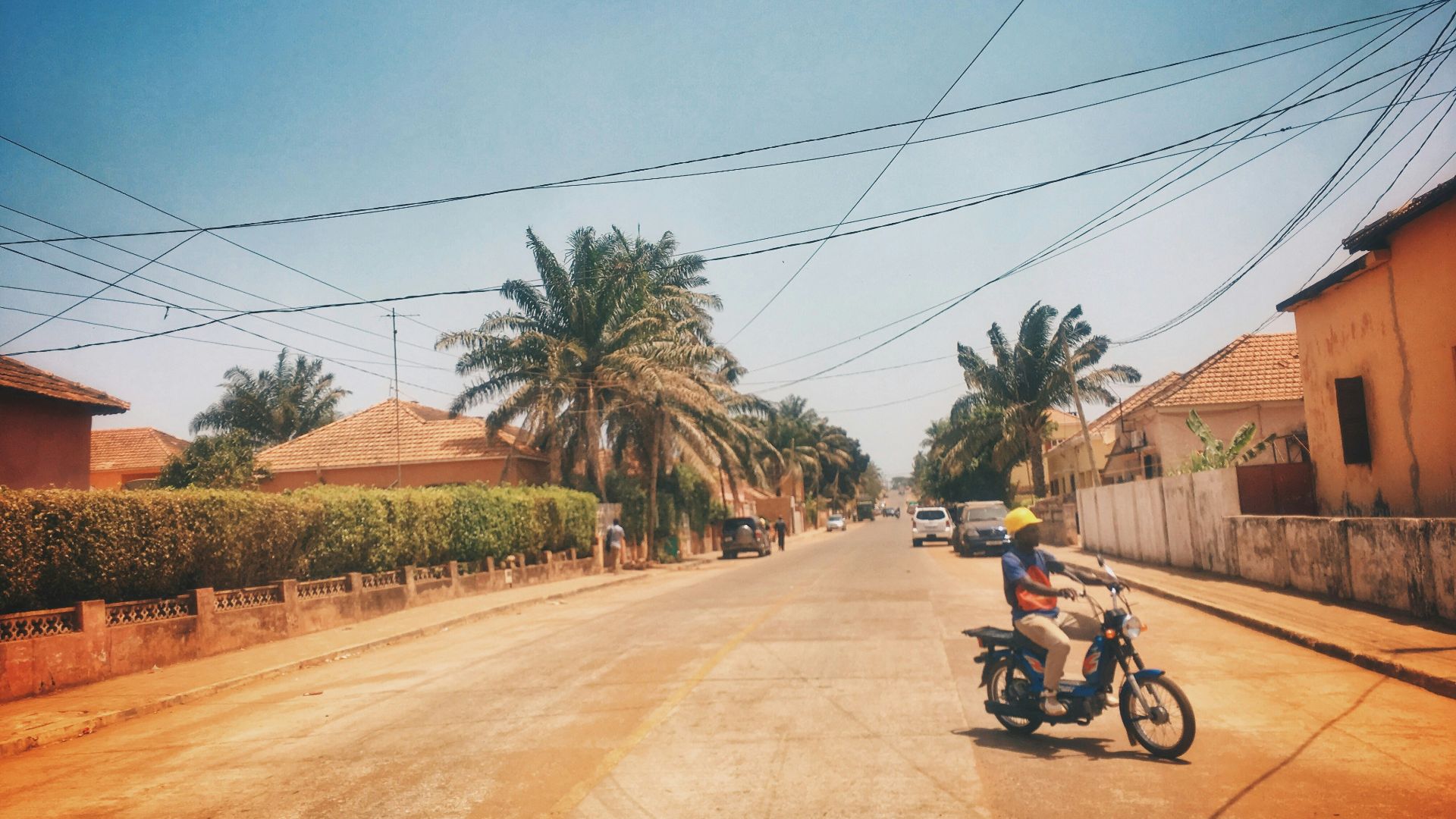 man riding motorcycle on road during daytime