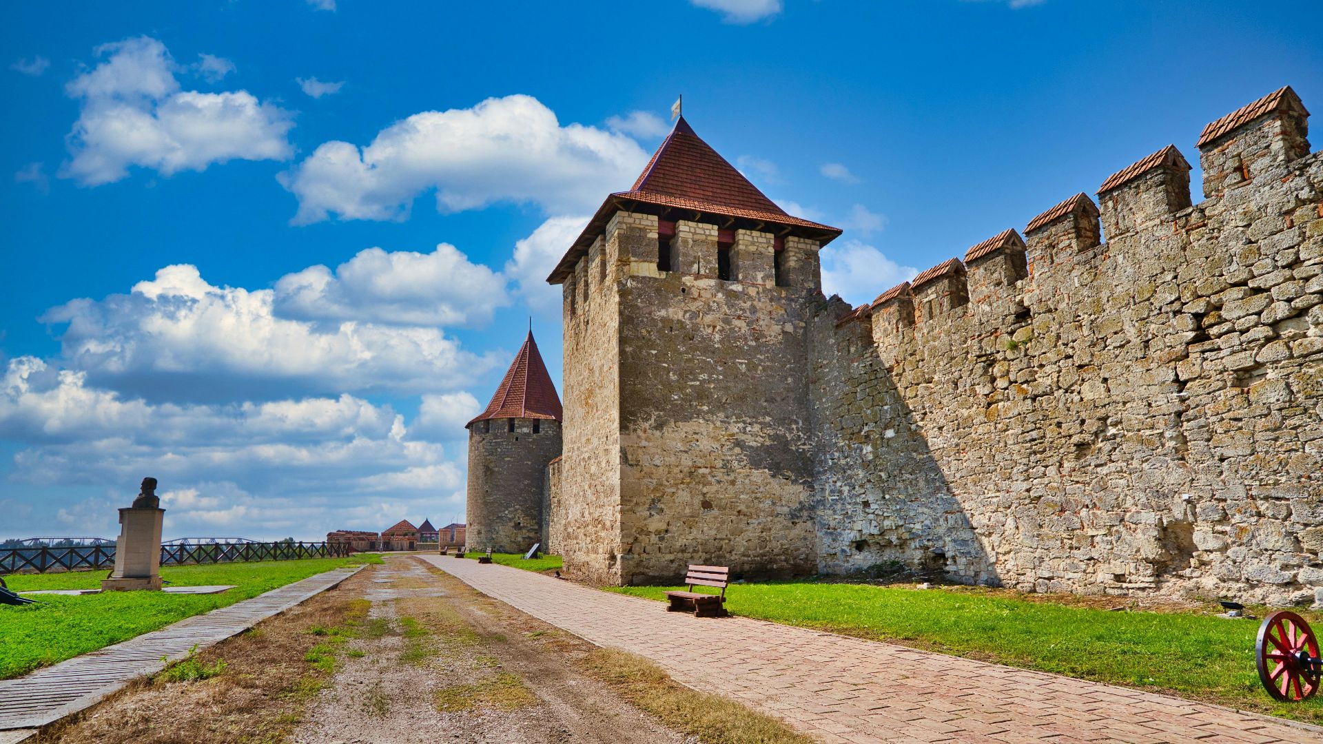 brown brick building under blue sky during daytime