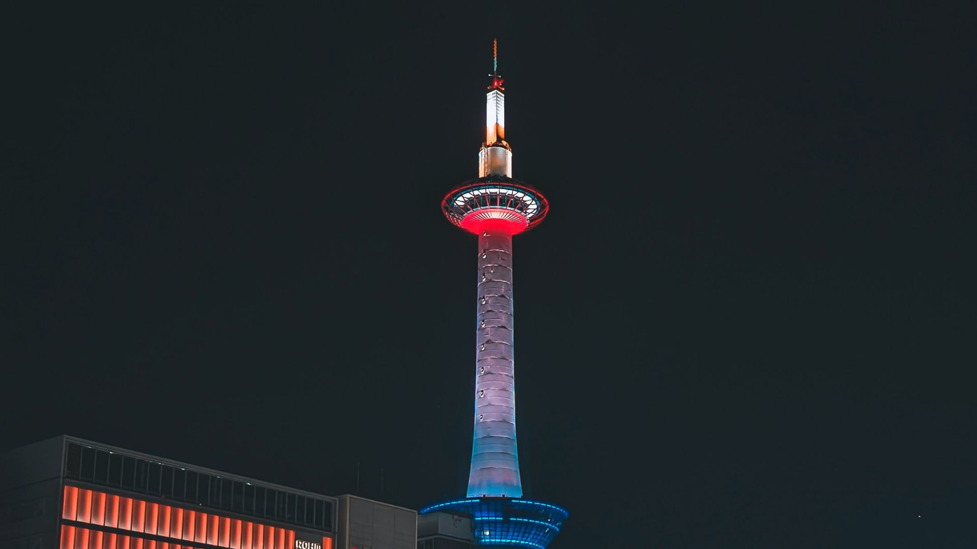 a large building with a tower in the middle of it