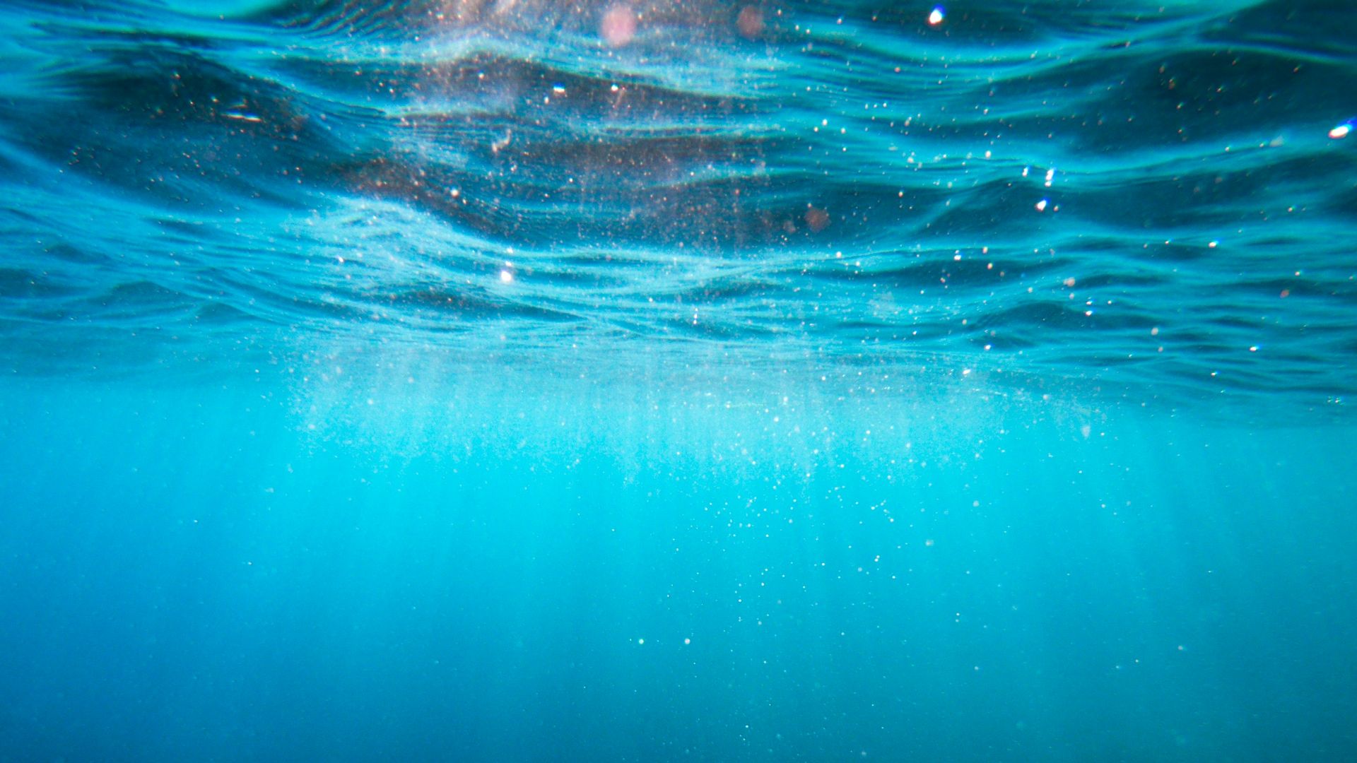 clear blue body of water