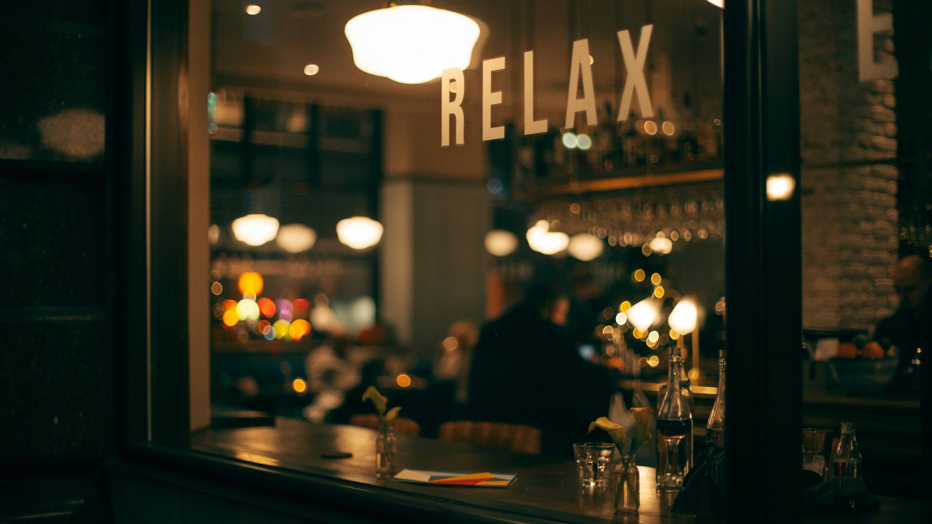 person sitting inside restaurant